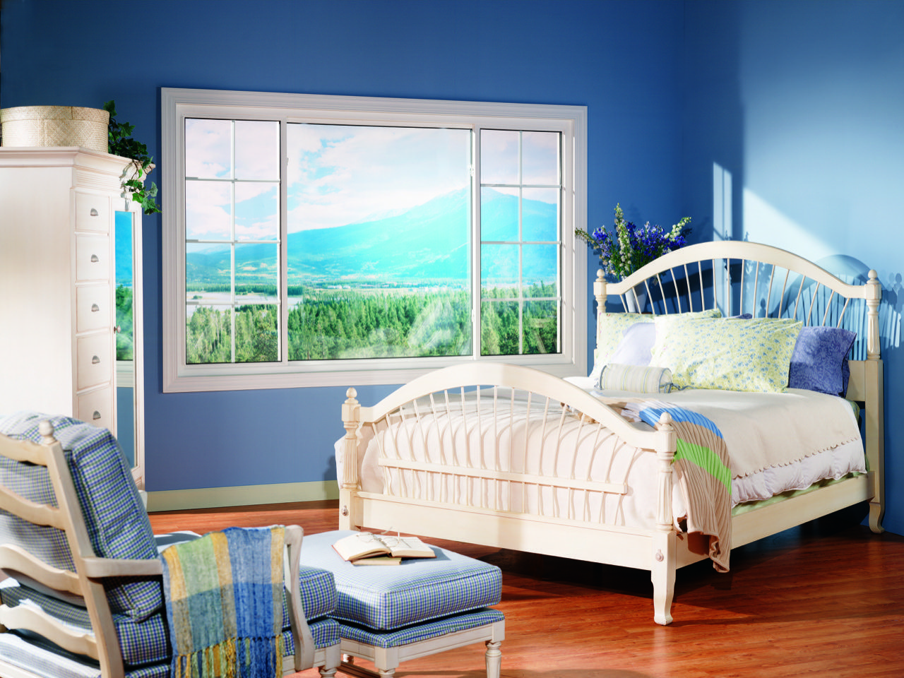 a bedroom with a white picture window